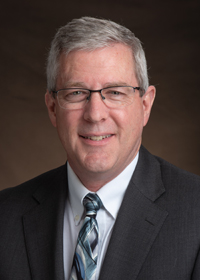 Headshot of Frayne Olson