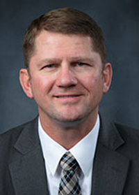 Headshot of Christopher Baumgartner