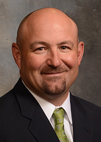Headshot of Mac McLennan