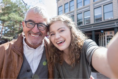 Smiling grandparent and grandchild
