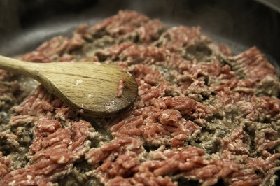Beef cooking in a pan