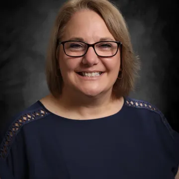 Headshot of Leslie Stevens