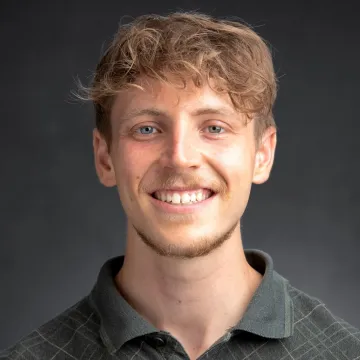 Headshot of Micah Gartenberg