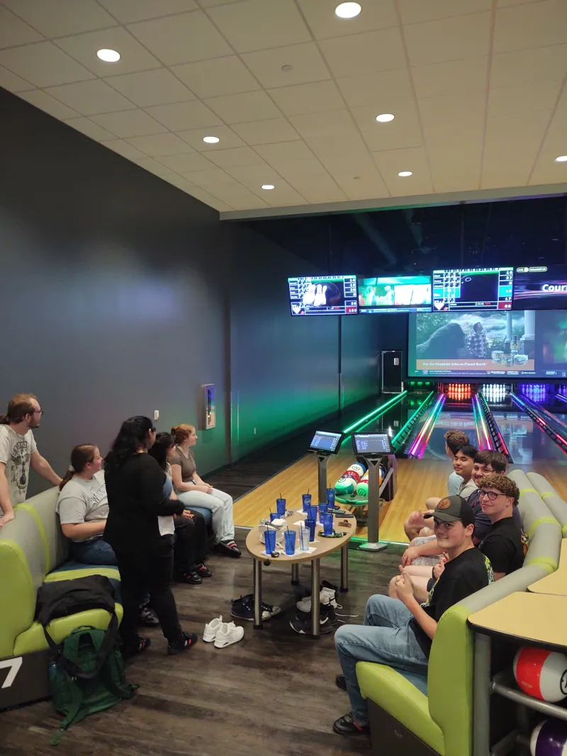 Photo of microbiology and biotechnology club members at a club bowling outing.