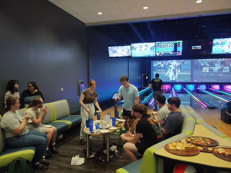 Microbiology and biotech students at a group outing at a local bowling alley.